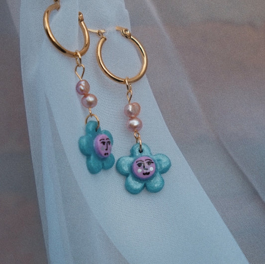 Blue Flower Face on Pearl Huggie Earrings