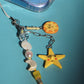 Yellow Shooting Star Reversible Charm