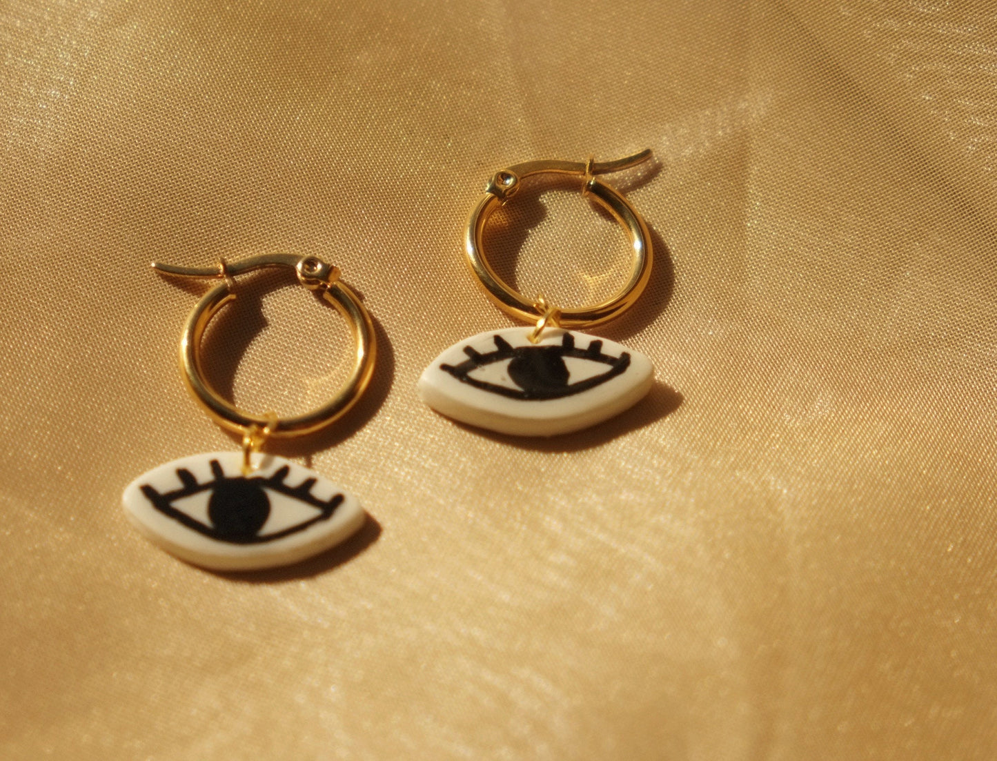 Eye Huggie Hoop Earrings